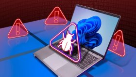 a-laptop-with-windows-11-a-malware-icon-above-the-keyboard-and-warning-signs-around-it